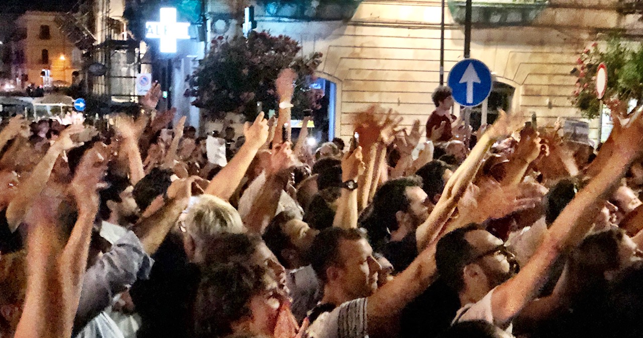 Some in the audience greeted Salvini with Fascist open-handed salutes